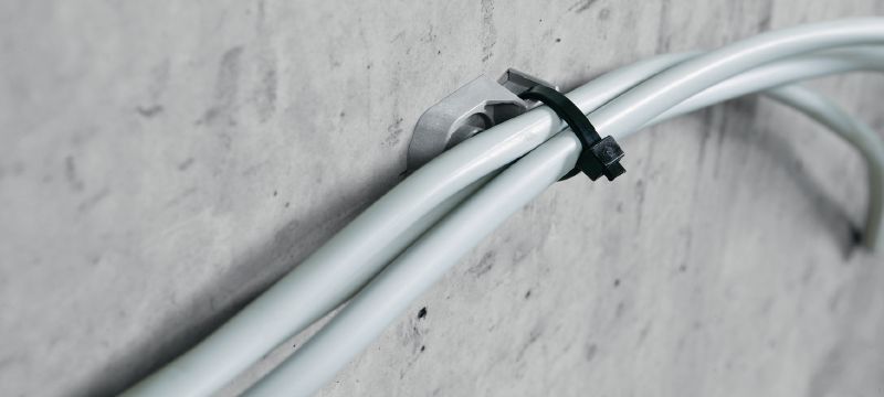Sujeción de cinta para cables X-ECT MX Brida de sujeción de plástico para conductos/cables para el uso con clavos en tiras Aplicaciones 1